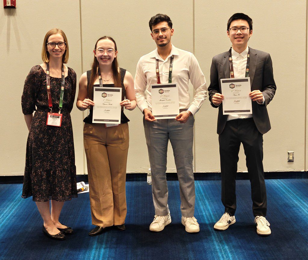 Professor Jennifer Farmer with the winners of the Robert G. Auld Student Paper Competition